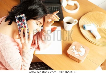 Young Woman Tired Of Work Migraine Stress