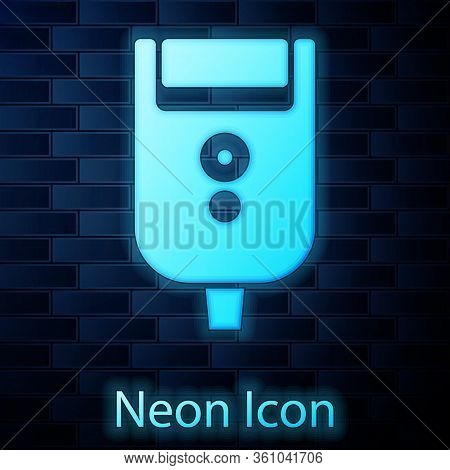 Glowing Neon Electric Razor Blade For Men Icon Isolated On Brick Wall Background. Electric Shaver. V