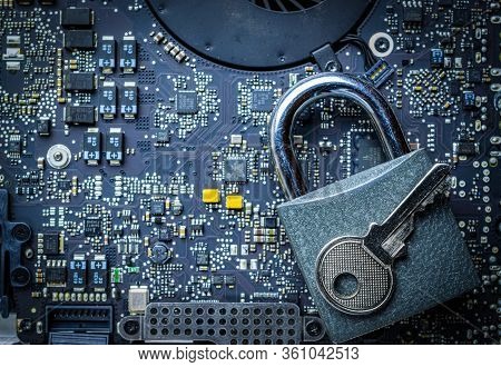 Data Protecting Security Concept. Computer Internet Protection With Lock, Key On Microscheme Chip. S
