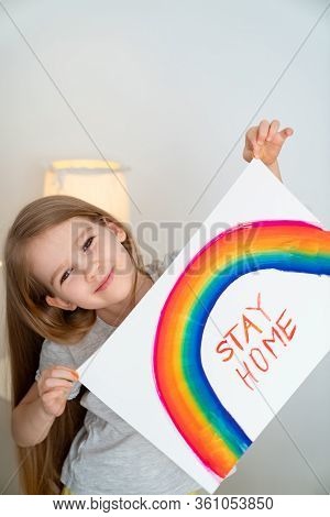 Child Girl With Blond Hair Drew A Rainbow And A Poster Stay Home. Flashmob Chasetherainbow.