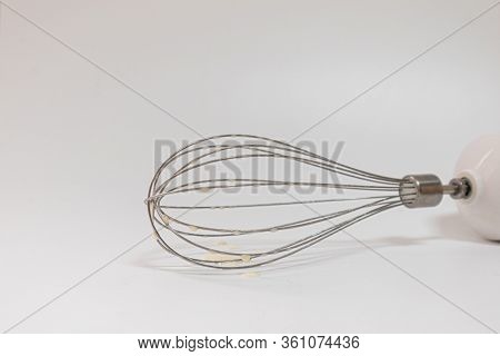 Eggbeater Tool Ready For Cooking And Blending Delicious Ingredients, Isolated, Copy Space
