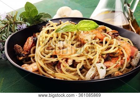 Seafood Pasta. Dish With Mediterranean Frutti Di Mare On Table