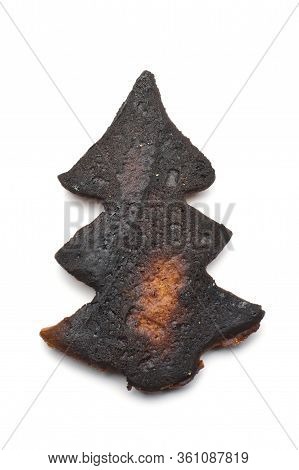 Burnt Black Gingerbread Biscuit Isolated On The White Background