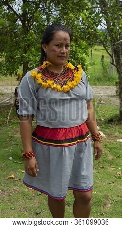 Lago Agrio, Sucumbios / Ecuador - February 20 2020: Woman Of The Cofan Ethnic Group Applying Makeup 