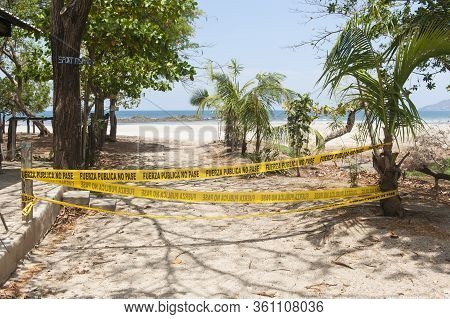 Entrance To Tamarindo Beach Blocked With Police Tape During Covid-19