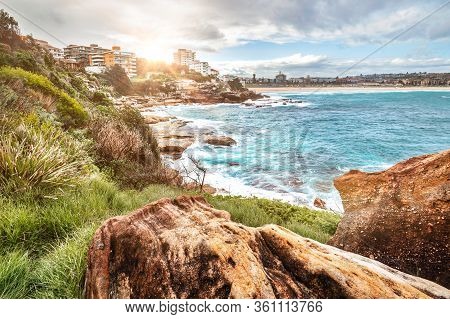 Sunset Abouv Beautiful Rocky Coastline Along The Coastal Walk From Bondi Beach In Sydney, Australia