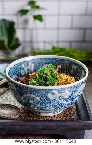 Rice Noodles With Spicy Pork Sauce (nam Ngiao) On Black Table, Thai Food.