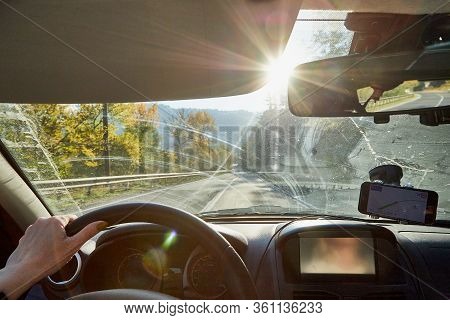 Tbilisi, Georgia - October 22, 2019: Car Vindow, Hand Of Woman On Steering Wheel And View To The Roa