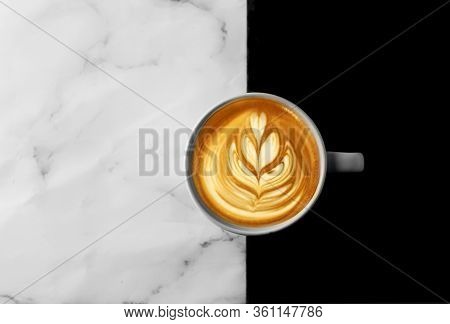 Barista Latte Art Capuccino On Blak And White Marble Table