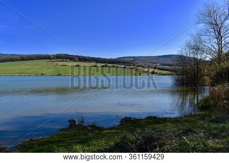 Spring Sun Walk Around A Large Lake In The Czech Republic.