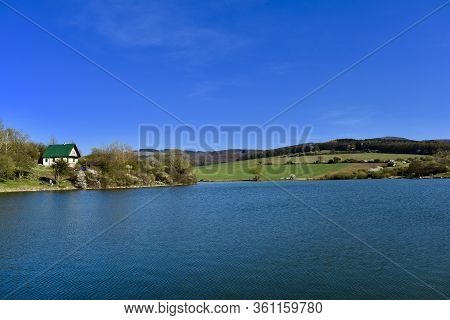 Spring Sun Walk Around A Large Lake In The Czech Republic.