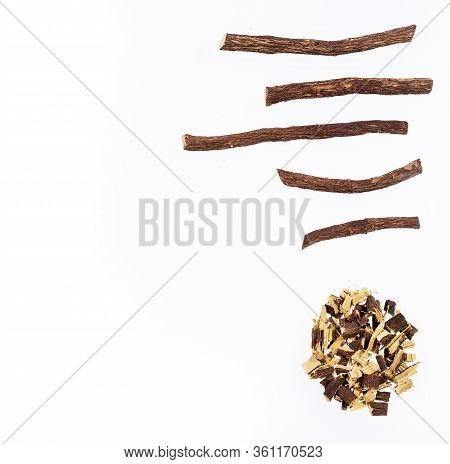 Close Up Of Ayurvedic Herb Liquorice Root,licorice Root, Mulethi Or Glycyrrhiza Glabra Root On A Woo