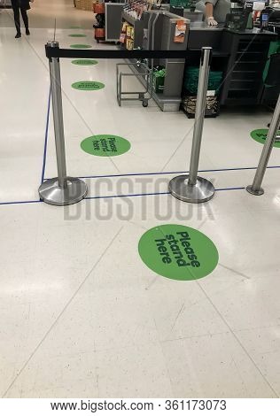 Sydney, Australia 2020-04 Covid-19. Stickers On The Floor At Woolworths Supermarket To Keep Social D
