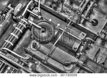 Inside View Of High Frequency Power Amplifier With Capacitors, Coils And Other Components In Black A
