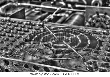 Inside View Of High Frequency Power Amplifier With Capacitors, Coils And Other Components In Black A