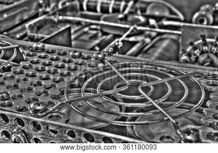 Inside View Of High Frequency Power Amplifier With Capacitors, Coils And Other Components In Black A
