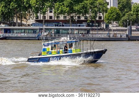 London, Uk - 25 July, 2018: Metropolitan Police Boat Sails London Thames At Hight Speed.