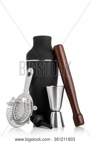 Cocktail Set With Black Shaker And Wooden Muddler And Measuring Jigger With Strainer On White Backgr