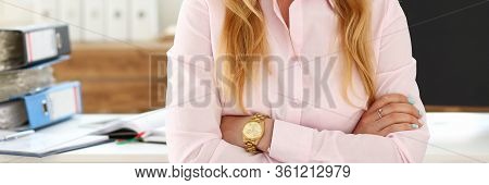 Portrait Of Smiling Businesswoman Posing With Crossed Arms In Company Office. Good-looking Employee 