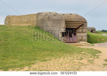 Remains Of The German Battery Which Was Captured On June 07 1944, Bunker And Artillery Guns