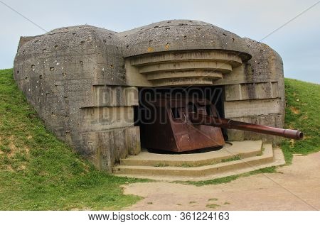 Remains Of The German Battery Which Was Captured On June 07 1944, Bunker And Artillery Guns