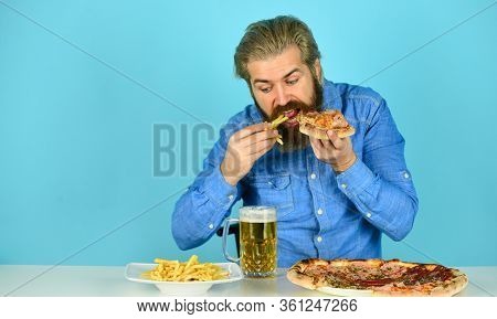Still Hungry. Beer And Food. Dinner At Pub. Hungry Man Going To Eat Pizza French Fries And Drink Bee