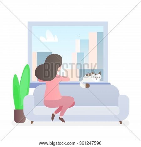 Girl Looks Out The Window On The Sofa At Home
