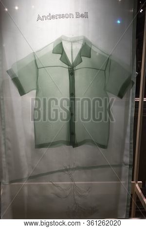 London, Uk - 15 February, 2020, Green Transparent Shirt In A Display Case For Sale In A Liberty Stor