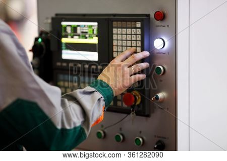 Operator Programs The Cnc Manufacturing Machine. Selective Focus.