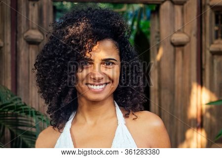 Natural Beautiful Mixed Race Woman Without Makeup In Tropical Gerden Park