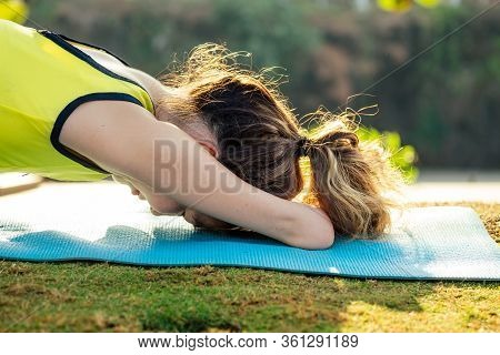 Happy Asian Armless Woman Warming Up Before Swimming At The Tropical Beach