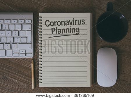 A Desk With A Notebook And Computer With The Business Planning For The Future And Forward Thinking B
