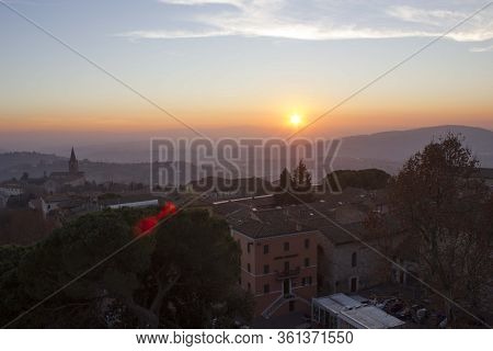 Perugia, Italy - December 9 2016: Sunset Through Umbrian Hills From Perugia City