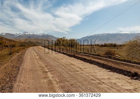 A367 Highway Passing In The Chui Region Of Kyrgyzstan Near The Village Of Kojomkul.