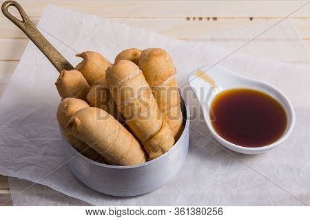 Latin-american Appetizers Called Tequenos Made Of Fried Corn Filled With Cheese.