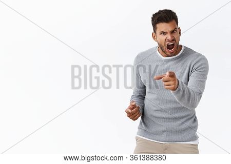 Outraged Handsome Man With Bad Temper Losing Control Over Emotions, Distressed Pointing Camera And S