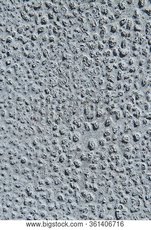 Metallic Wall Background, Texture. Grey Uneven Surface With An Abstract Pattern Of The Remains Of Ol
