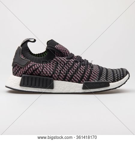 Vienna, Austria - August 24, 2017: Adidas Nmd Black, Grey And Pink Sneaker On White Background.
