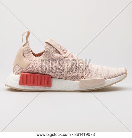 Vienna, Austria - August 24, 2017: Adidas Nmd R1 Rose Sneaker On White Background.