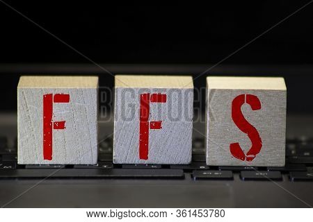 Concept Image Of Business Acronym Ffs As Fee For Services Written Over Road Marking Yellow Paint Lin