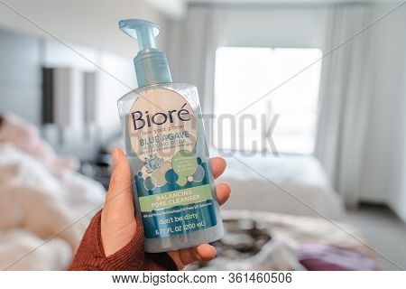 Maple Grove, Minnesota - April 15, 2020: Hand Holds A Biore Brand Blue Agave And Baking Soda Face Wa