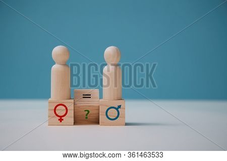 Gender Equality. Human Rights. Sexual Equality. Wooden Figures On Cubes With Feminism And Masculism 