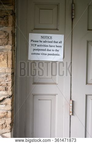 Elkins Park, Pennsylvania - April 14th, 2020: A Sign On A Door States All Tcp Activities Are Postpon