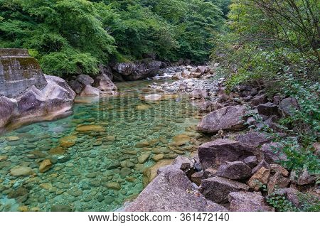 Forest River Landscape With Fresh Clear Water And Rocks, Boulders. Beautiful Mountain River Landscap