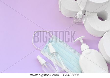Set Of Important Items For Covid-19 Quarantine Times. Toilet Paper With Surgical Face Mask And Hand 
