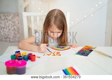 Little Girl With Blond Hair Drew A Rainbow And A Poster Stay Home. Flashmob Chasetherainbow.
