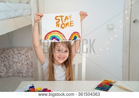 A Small Girl With Blond Hair Drew A Rainbow And A Poster Stay Home. Flashmob Chasetherainbow.