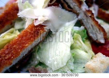 Caeser Salad Close-up. Food And Ingredient Background.