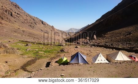 Imlil/morocco - 09.30.2019: Camping Spot With Tents In Front Of Refuge Toubkal Les Mouflons, In Atla