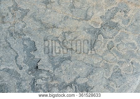 Stone Texture. Structural Surface Close-up. Stone Old Wall.  Granite Natural Surface. Texture Patter